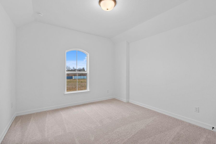 A secondary bedroom offering timeless style with flexible space for guests or everyday living. A secondary bedroom offering timeless style with flexible space for guests or everyday living.