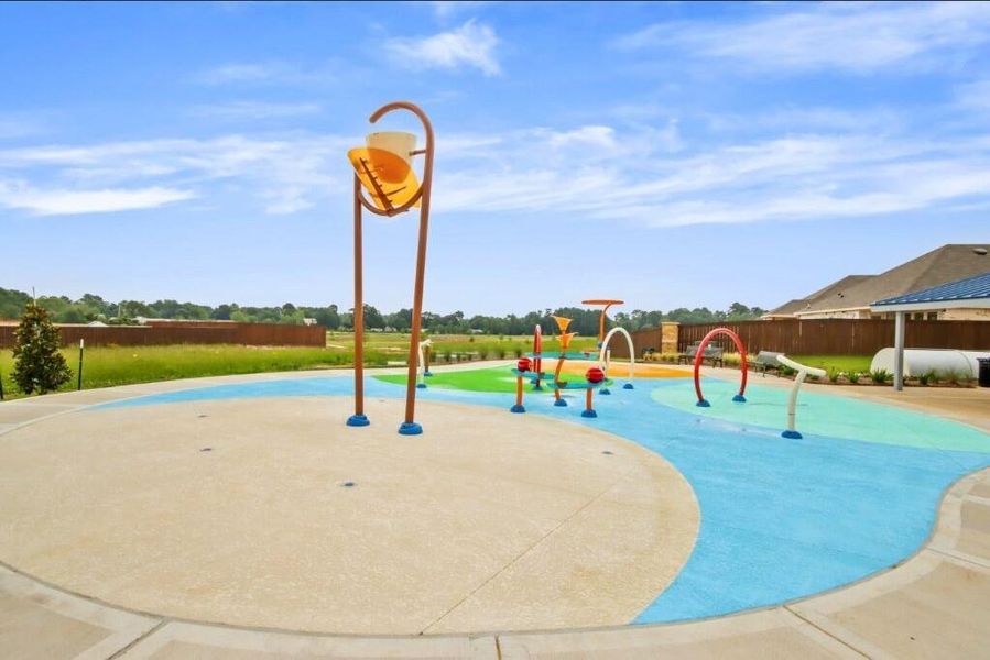 Our "Texas size" splash pad is a perfect place to cool off on the hot summer days! Our "Texas size" splash pad is a perfect place to cool off on the hot summer days!
