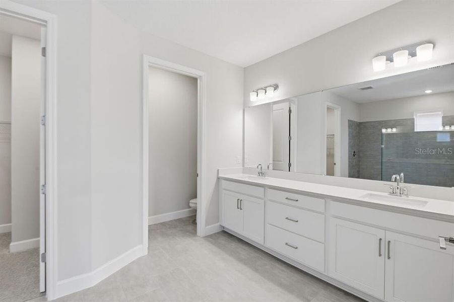 Furnished interior view inside a new home in Harvest at Ovation, Winter Garden (Image 4).