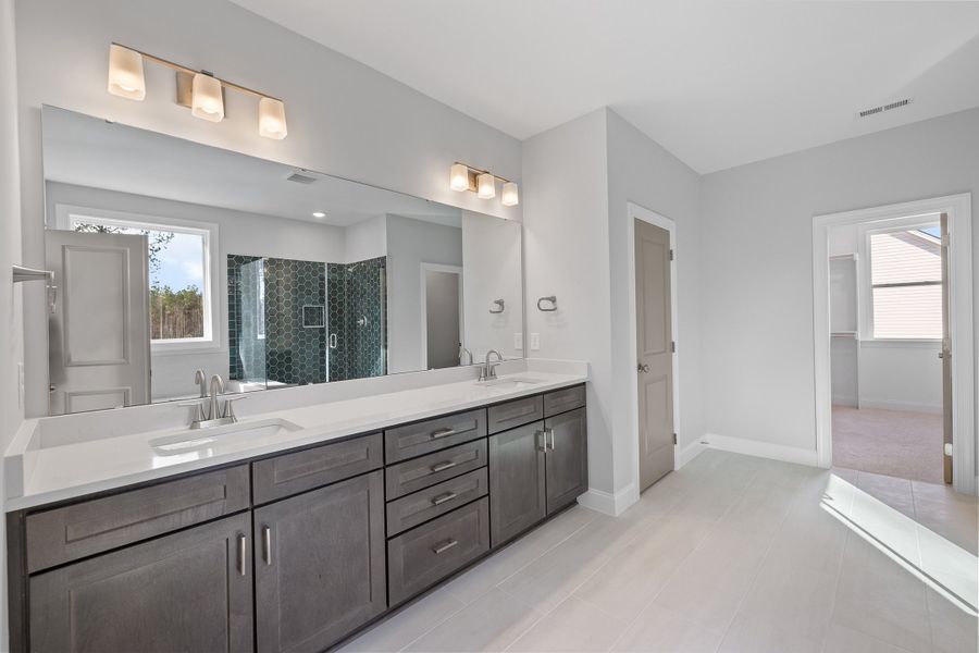 Representative furnished interior of a home built from the The Hampton by RobuckHomes in Baylee Ridge, Selma (Image 97).