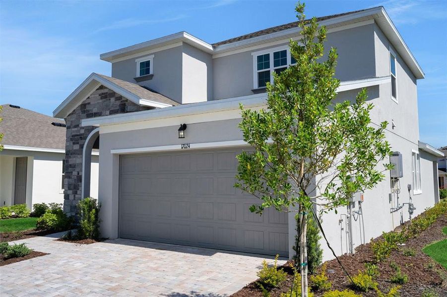 Front exterior of a new home in , Punta Gorda, FL, highlighting curb appeal (Image 25).