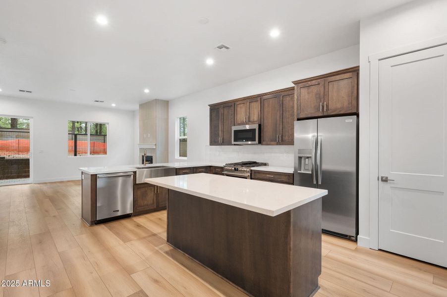 Kitchen to Living Room-lot-17-plan-2303-