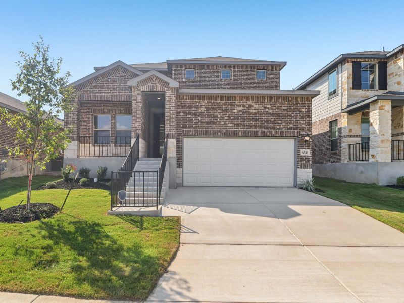 Front exterior of the Matador floorplan at a Meritage Homes community. Front exterior of the Matador floorplan at a Meritage Homes community.