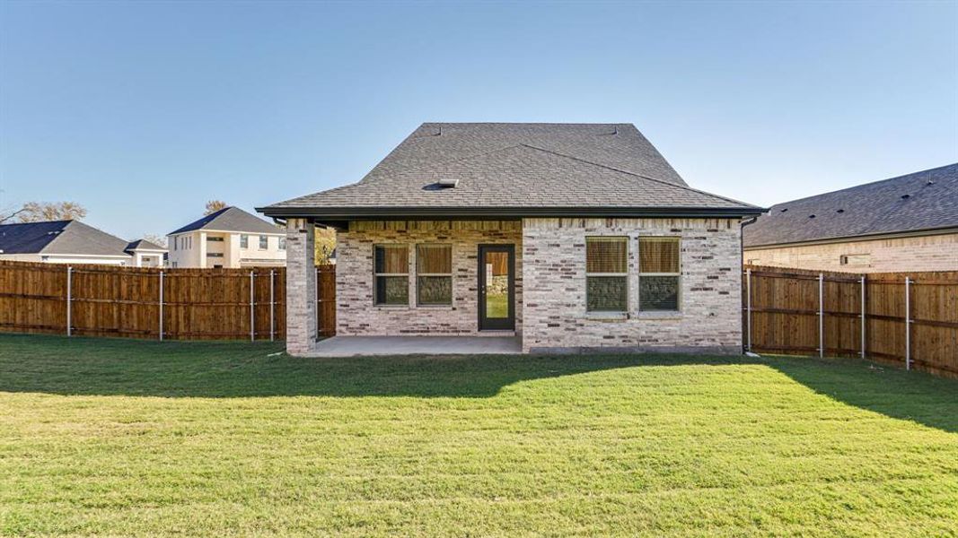 Exterior details and patio area of a home in Eastridge - Spring Series, McKinney (Image 3). Exterior details and patio area of a home in Eastridge - Spring Series, McKinney (Image 3).