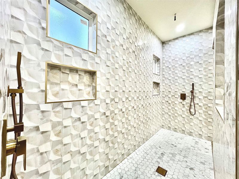 Primary Shower Room with double shower heads, Window and Big Shampoo area.
