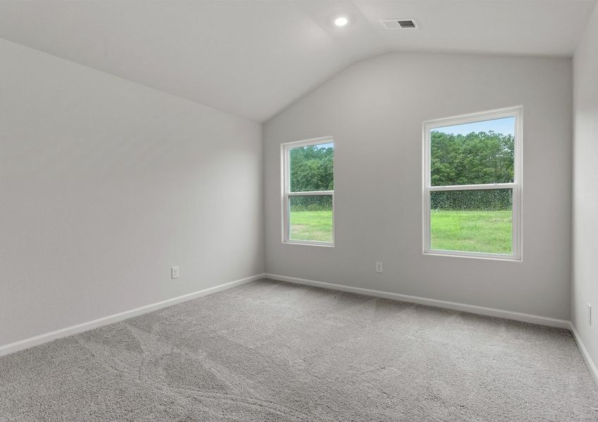 The master bedroom has plenty of space for your king-sized furniture