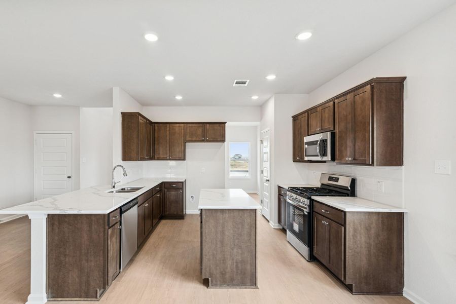 The Georgetown II- Kitchen. Home under construction, photo used for illustrative purposes only, colors and options will vary.