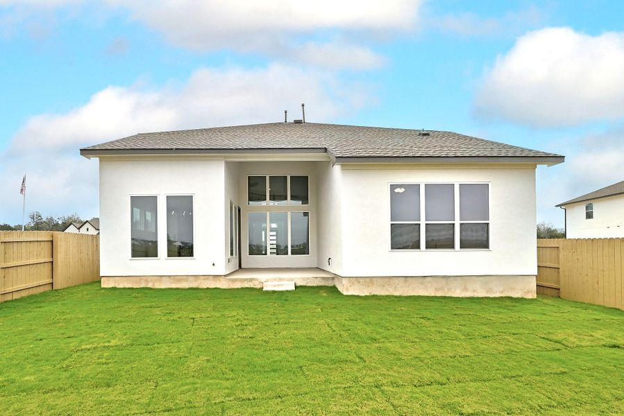 Exterior details and patio area of a home in The Colony, Bastrop (Image 28).