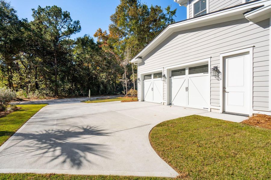 Exterior details and patio area of a home in , Johns Island (Image 52).