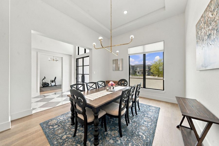 Generously sized and full of natural light, this dining room sets the scene for everything from everyday meals to holiday gatherings.