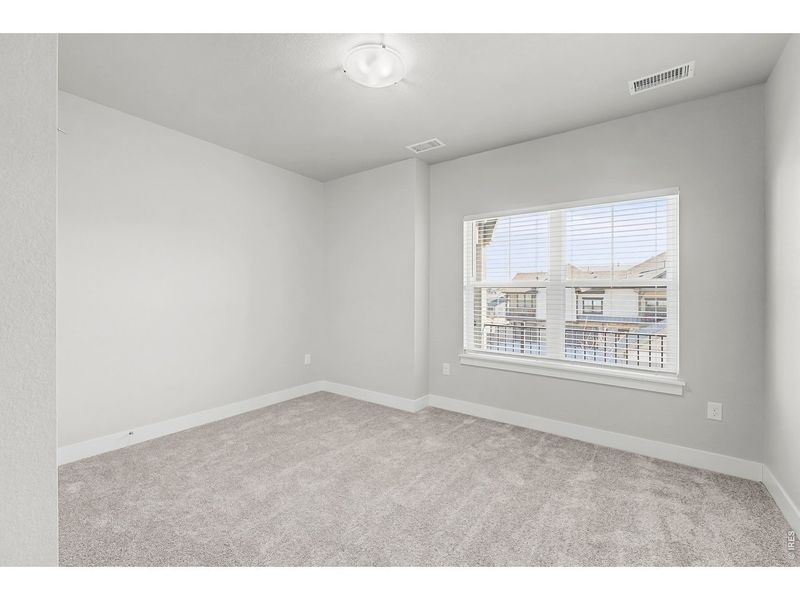 Spacious, unfurnished interior of a new home in Highlands at Fox Hill - The Flats, Longmont (Image 16).