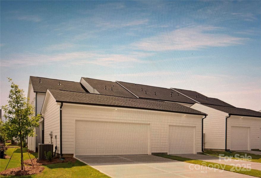 Front exterior of a new home in Edgewood Preserve, Huntersville, NC, highlighting curb appeal (Image 1). Front exterior of a new home in Edgewood Preserve, Huntersville, NC, highlighting curb appeal (Image 1).