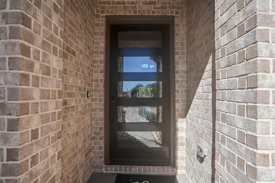 Exterior details and patio area of a home in Sienna 65', Missouri City (Image 27).