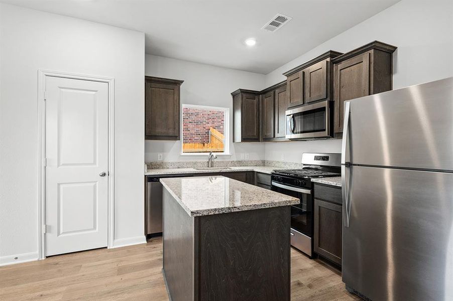 Furnished interior view inside a new home in Patriot Estates, Venus (Image 4).
