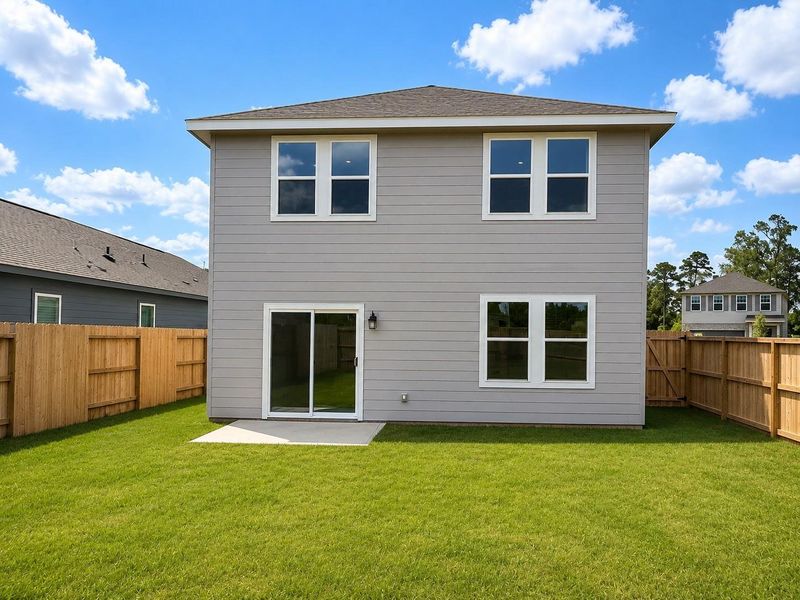 Exterior details and patio area of a home in Stonebrooke, Conroe (Image 3).