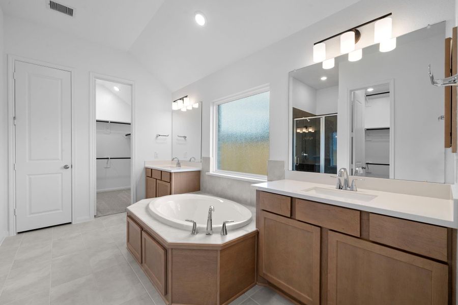 Furnished interior view inside a new home in Bridgeland, Cypress (Image 13).