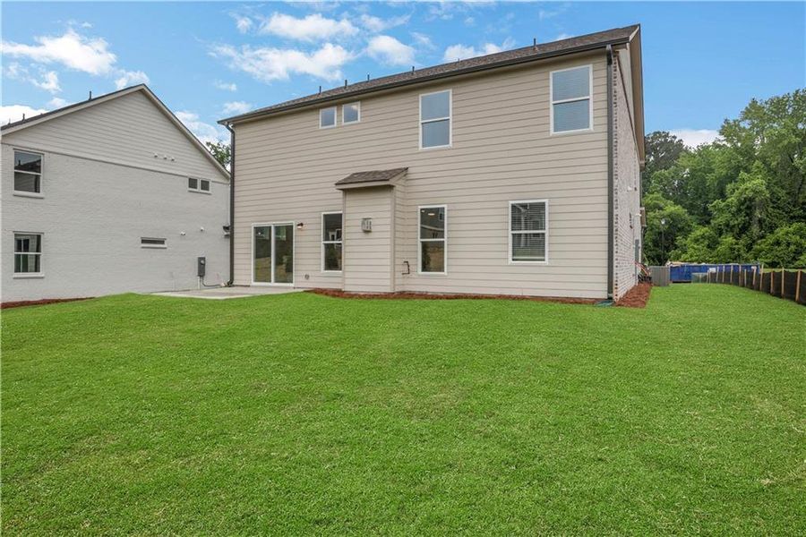 Exterior details and patio area of a home in , Loganville (Image 3).