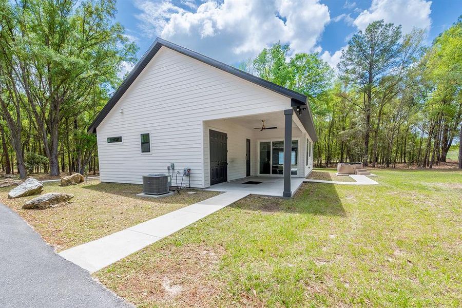 Exterior details and patio area of a home in , Fort White (Image 3).
