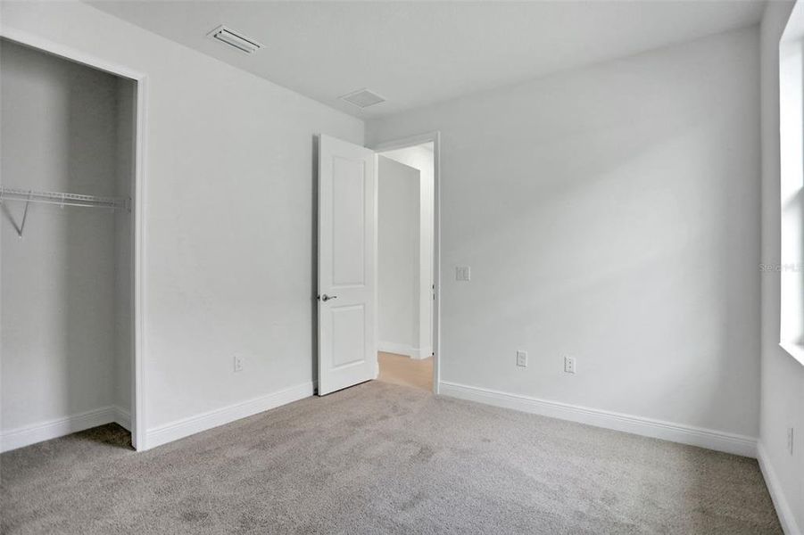 Spacious, unfurnished interior of a new home in Angeline, Land O' Lakes (Image 27).