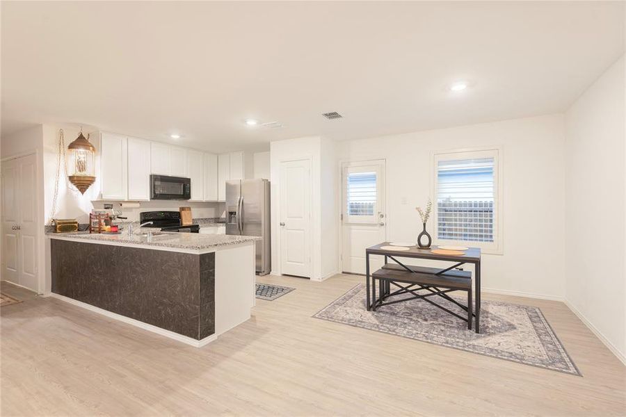 Furnished interior view inside a new home in Tillage Farms, Princeton (Image 16).
