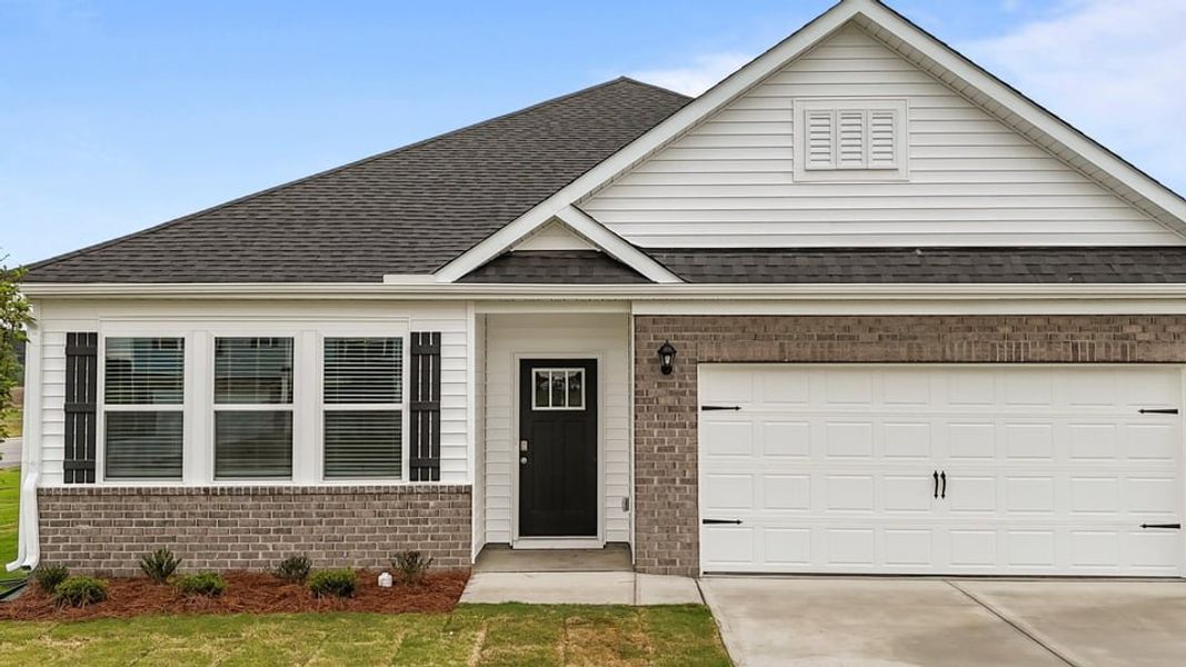 Front exterior of a new home in Cambridge Park, Mebane, NC, highlighting curb appeal (Image 1).