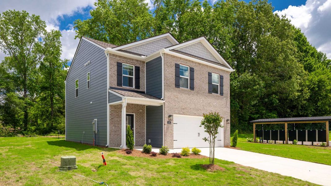 Front exterior of a new home in Fairview Hills, Cleveland, TN, highlighting curb appeal (Image 18). Front exterior of a new home in Fairview Hills, Cleveland, TN, highlighting curb appeal (Image 18).