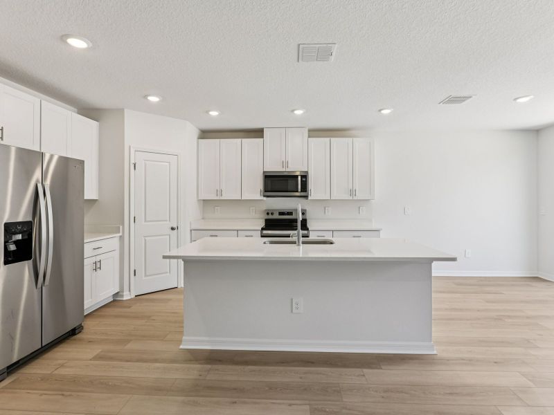 Furnished interior view inside a new home in Salt Meadows - Classic Series, Parrish (Image 3).