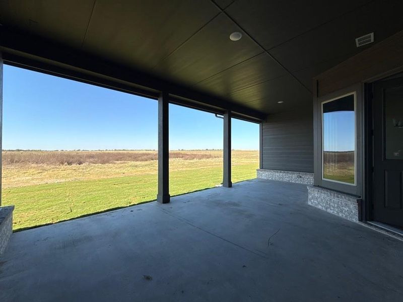 Exterior details and patio area of a home in Clear Sky Addition, Valley View (Image 3).