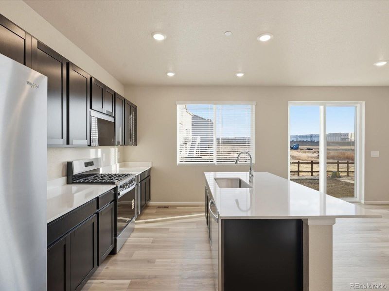 Furnished interior view inside a new home in , Commerce City (Image 11).