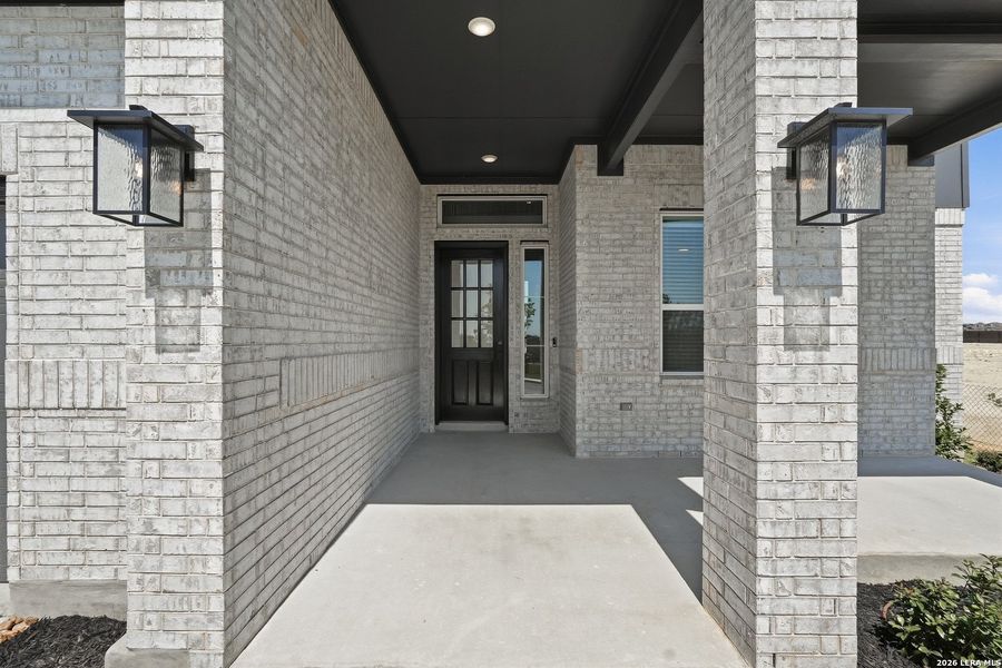 Exterior details and patio area of a home in Prominence Urban, San Antonio (Image 3).