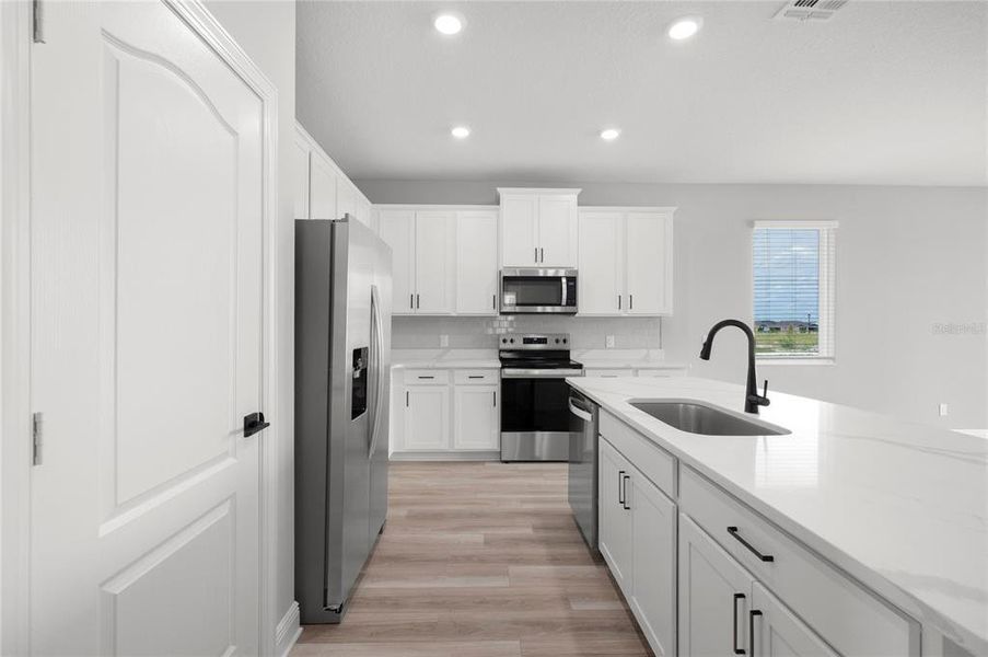 Furnished interior view inside a new home in Gum Lake Preserve, Lake Alfred (Image 8).