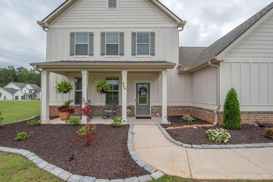 Front exterior of a new home in , Senoia, GA, highlighting curb appeal (Image 28). Front exterior of a new home in , Senoia, GA, highlighting curb appeal (Image 28).