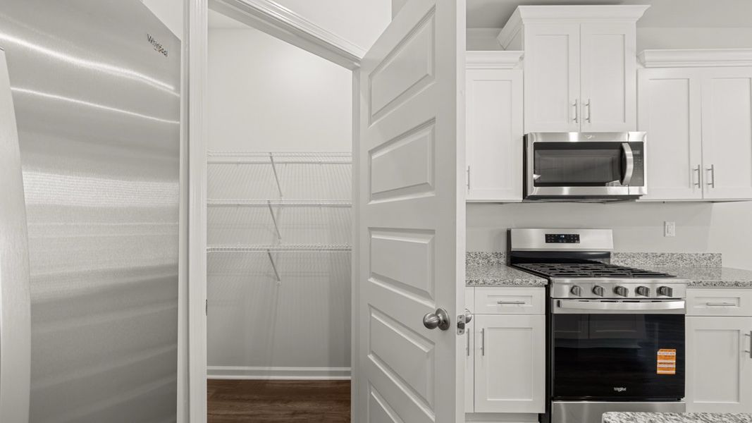 Representative furnished interior of a home built from the Hayden by D.R. Horton in Southwind Village, Evans (Image 10).