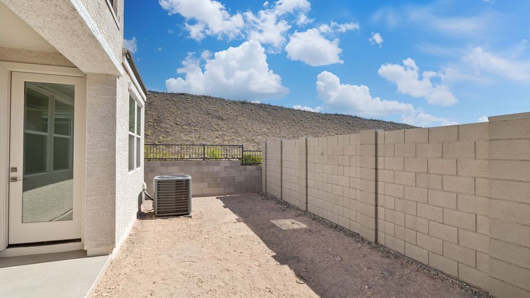 Exterior details and patio area of a home in The Buttes at Mystic, Peoria (Image 4).