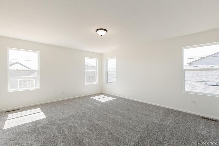 Spacious, unfurnished interior of a new home in Legato, Commerce City (Image 23).