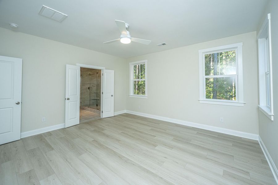 Spacious, unfurnished interior of a new home in , Awendaw (Image 10).