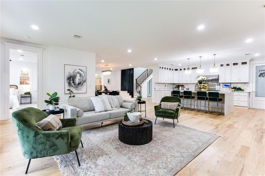 Living room with light wood-type flooring