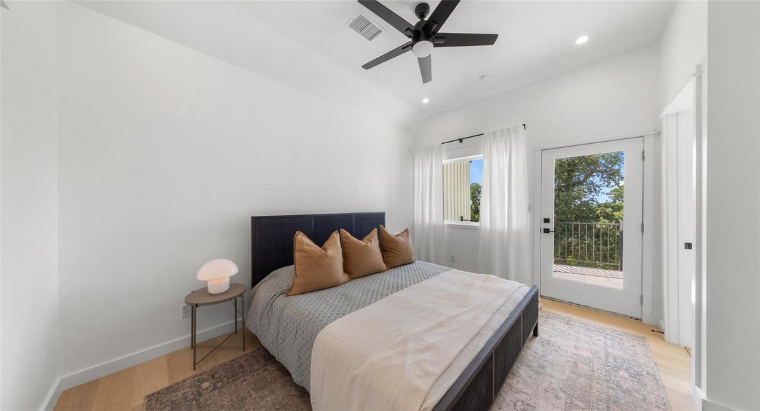 A vaulted-ceiling primary suite that feels open and serene — a true retreat to recharge in. Model No. 105 Shown.