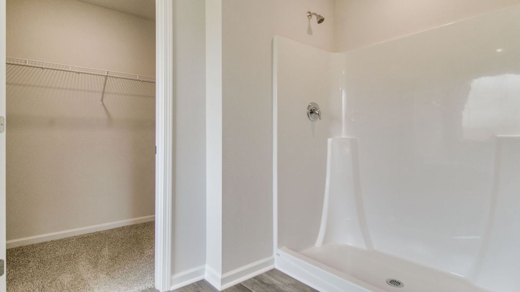 Spacious, unfurnished interior of a new home in The Enclave at Bar W Ranch, Baker (Image 22).