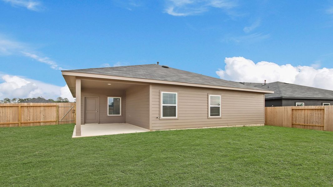 Exterior details and patio area of a home in Grand Pines, Magnolia (Image 2).