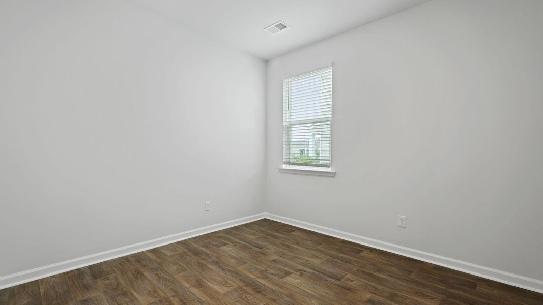 Spacious, unfurnished interior of a new home in Pine Hills at Cane Bay, Summerville (Image 12). Spacious, unfurnished interior of a new home in Pine Hills at Cane Bay, Summerville (Image 12).