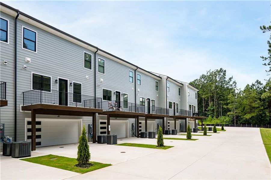 Front exterior of a new home in , Stockbridge, GA, highlighting curb appeal (Image 31).