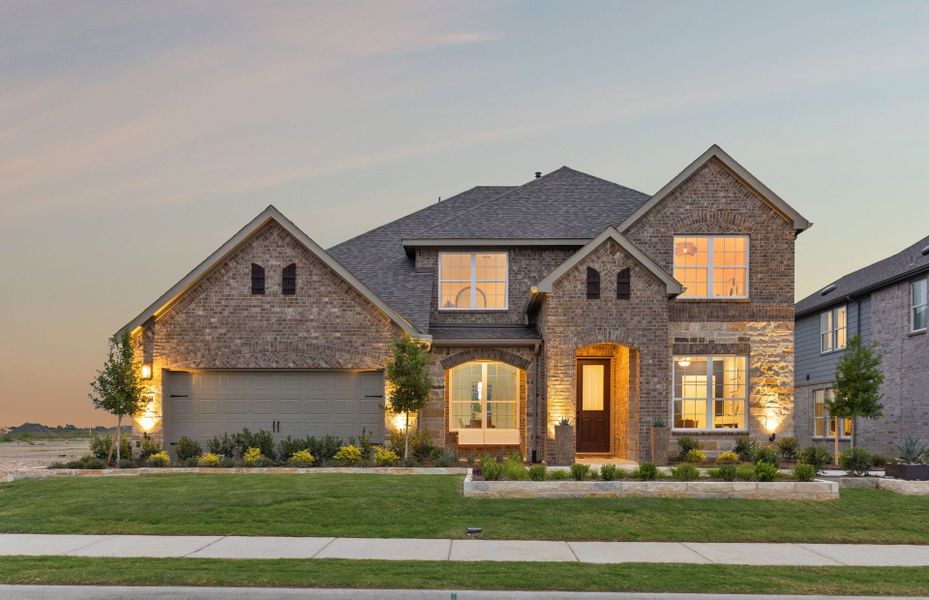 Exterior D model home with stone accents and covered front porch