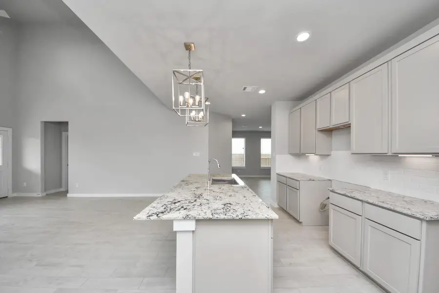 Sample photo of completed home with similar floor plan. Actual colors and selections may vary.