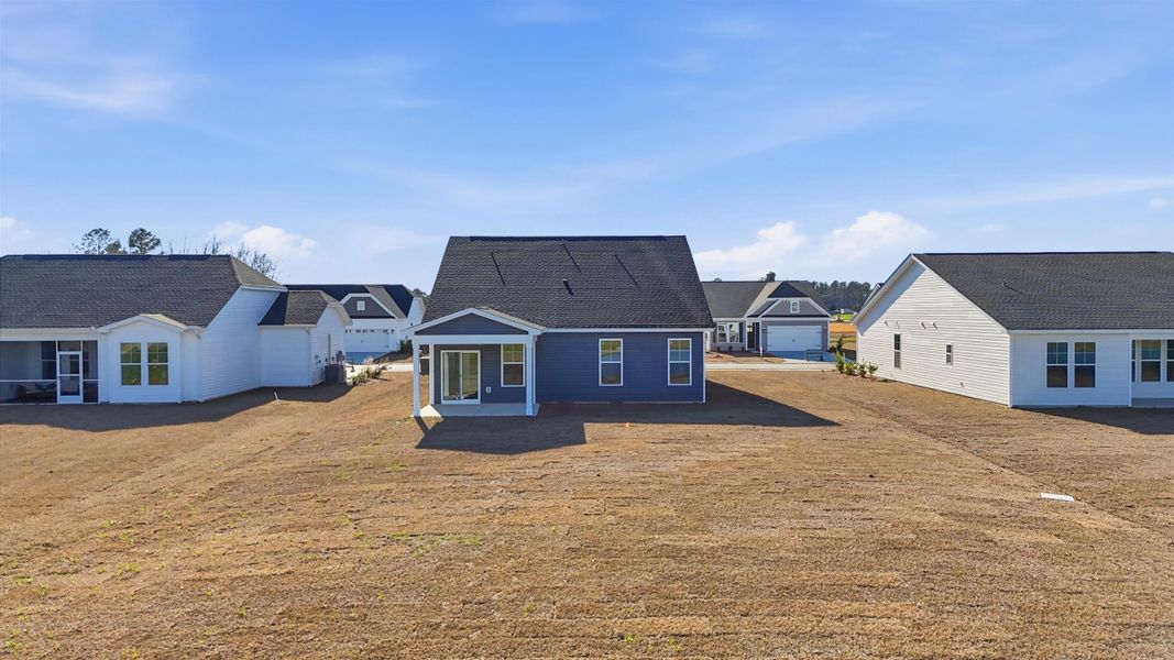 Rear view of property with a residential view Rear view of property with a residential view