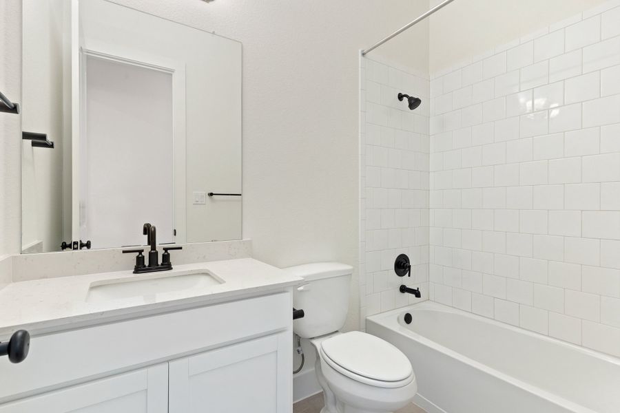 Representative furnished interior of a home built from the Waterville by Ashton Woods in The Trails at Carmel, Pflugerville (Image 5).