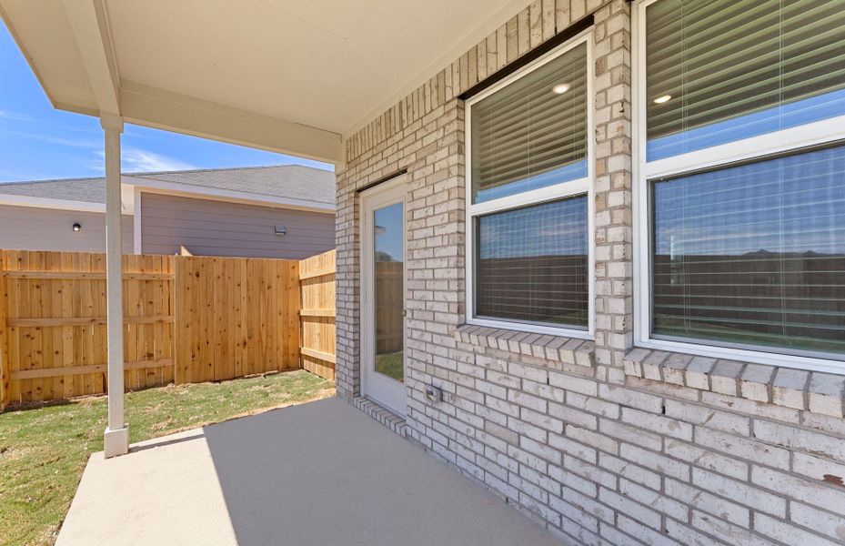 Exterior details and patio area of a home in Sunfield, Buda (Image 4). Exterior details and patio area of a home in Sunfield, Buda (Image 4).
