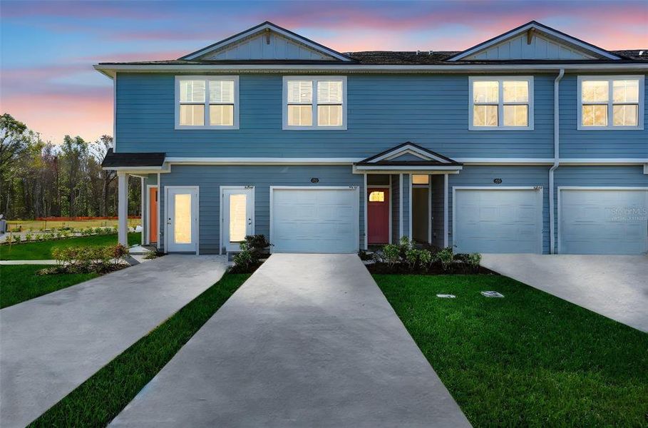 Front exterior of a new home in Cary Landing, Jacksonville, FL, highlighting curb appeal (Image 2). Front exterior of a new home in Cary Landing, Jacksonville, FL, highlighting curb appeal (Image 2).