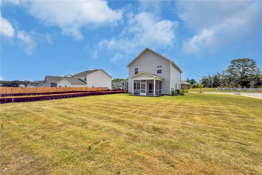 Exterior details and patio area of a home in Brownstone Park, Easley (Image 17).