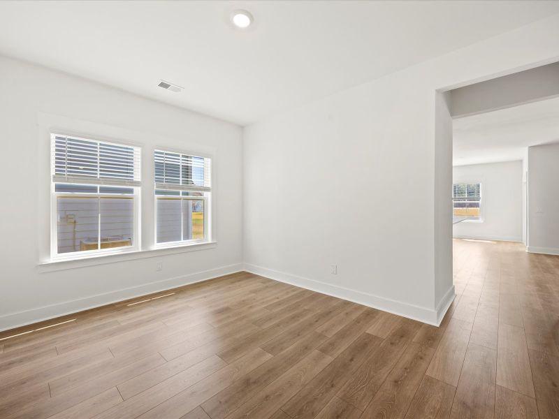 Spacious, unfurnished interior of a new home in The Coves at Lakes of Cane Bay II, Summerville (Image 28). Spacious, unfurnished interior of a new home in The Coves at Lakes of Cane Bay II, Summerville (Image 28).